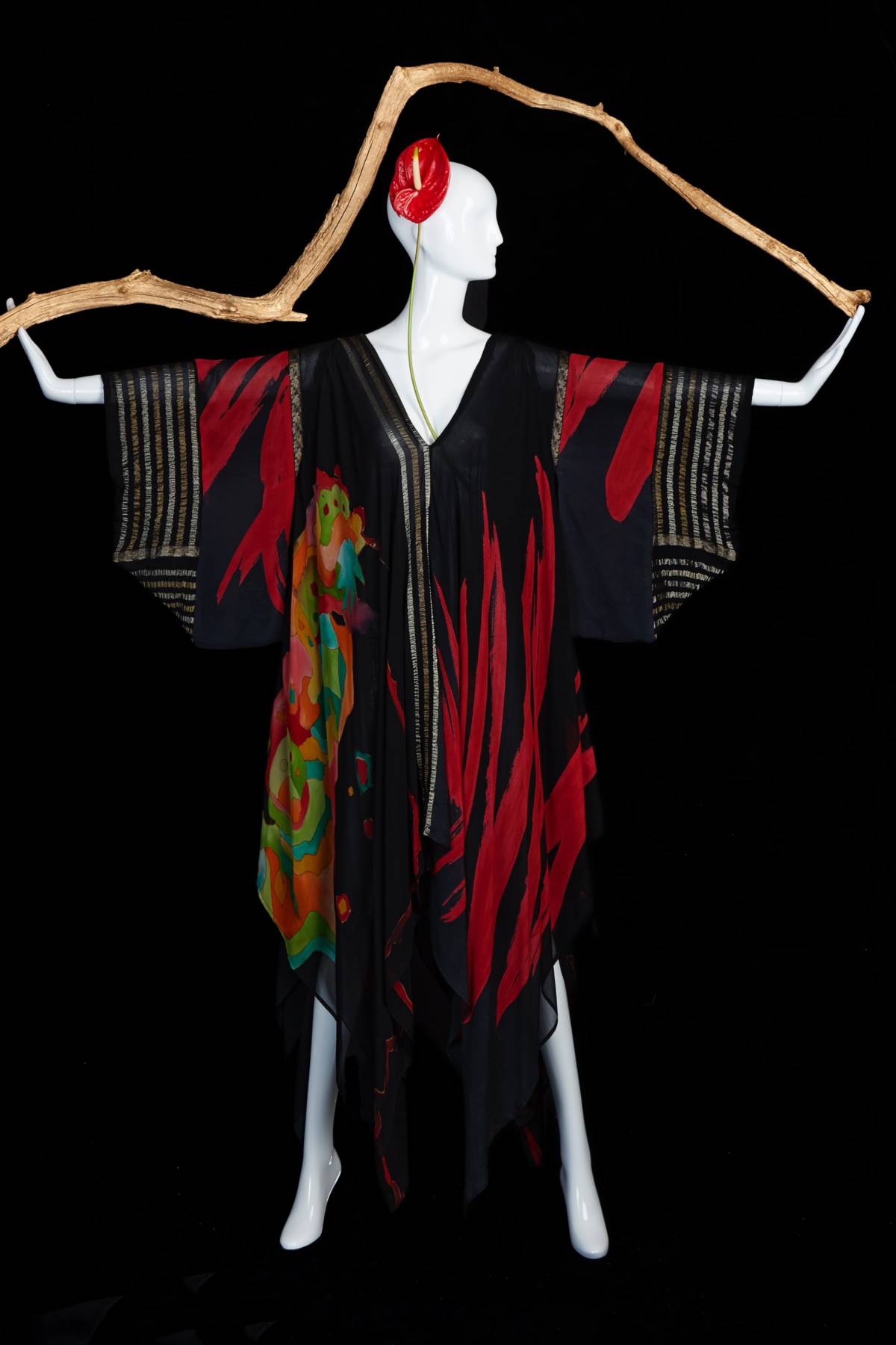 Collection caftan on mannequin with branch